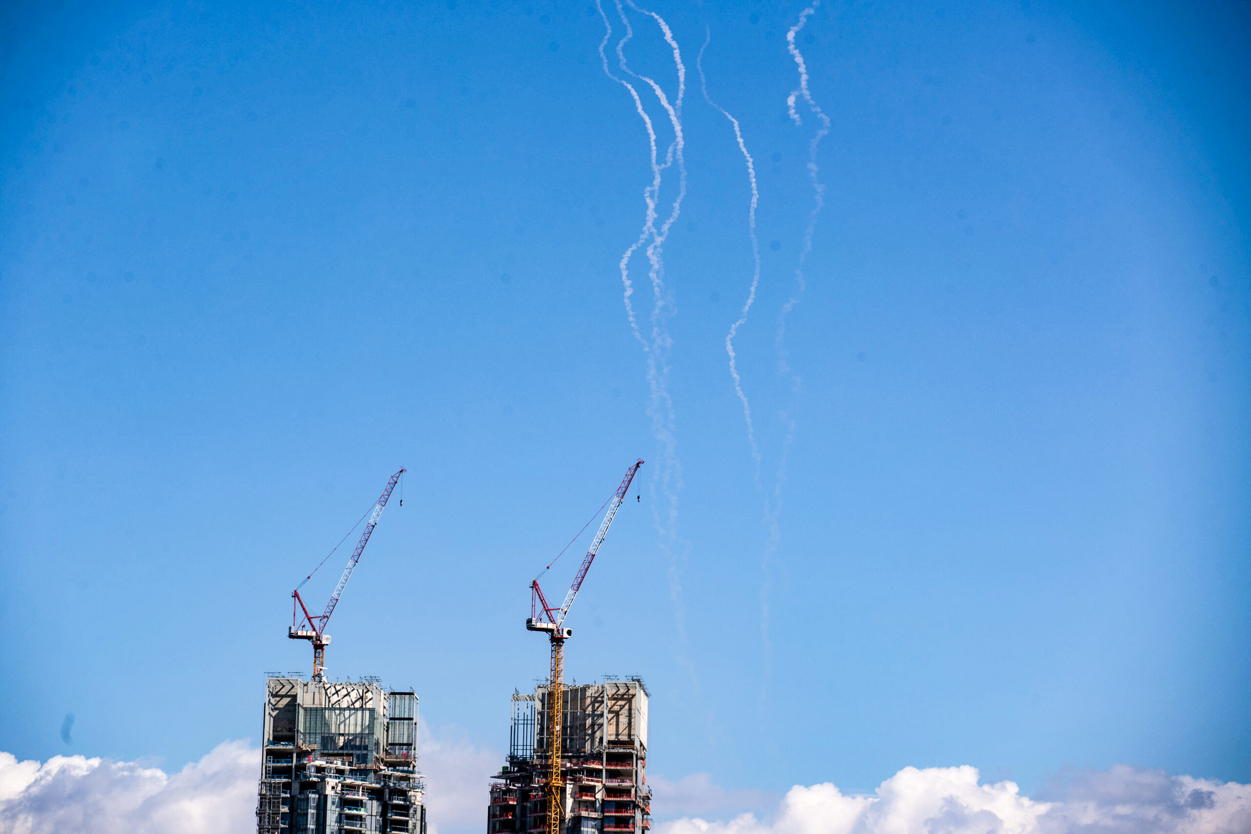 Tel Aviv: This photo taken on March 1, 2026 shows smoke trails left by interceptor missiles launched from Israeli air defense systems in downtown Tel Aviv, Israel. Multiple explosions were heard in Tel Aviv on Sunday, eyewitnesses said, as Israel's military said it was operating to intercept new barrages of missiles from Iran that triggered air raid sirens across the country. (Xinhua via IANS)