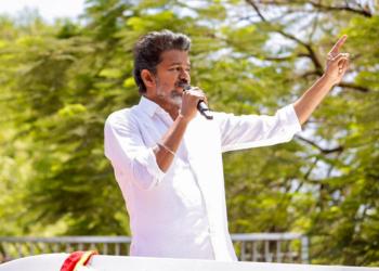 Tiruchirappalli: Tamilaga Vettri Kazhagam (TVK) President and actor Vijay addresses a roadshow ahead of filing nomination papers from the Trichy East Assembly constituency for the Tamil Nadu Assembly elections in Tiruchirappalli on Thursday, April 2, 2026. (Photo: IANS/X/@TVKWarriorsHQ)