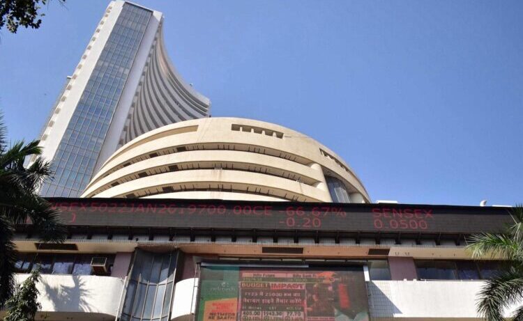 Mumbai:People walk past the Bombay Stock Exchange (BSE) building in Mumbai, on Tuesday, Feb 1. 2022.Prime Minister Narendra Modi's government on Tuesday announced a series of investments to shore up spending in infrastructure projects in its annual budget.(Photo:IANS)