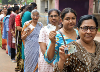 Jhargram: People wait in a queue to cast their votes during the first phase of the West Bengal Assembly elections in Jhargram district on Thursday, April 23, 2026. (Photo: IANS)