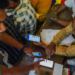 Morigaon: Demonstration of Electronic Voting Machine (EVM) and ECINET app is given to presiding and polling officers ahead of the Assembly elections in Morigaon on Friday, March 27, 2026. (Photo: IANS)