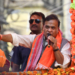 Bankura: Assam Chief Minister Himanta Biswa Sarma speaks during a public meeting as a part of his election campaign ahead of the West Bengal assembly elections in Bishnupur, Bankura, Tuesday, April 21, 2026. (Photo: IANS)