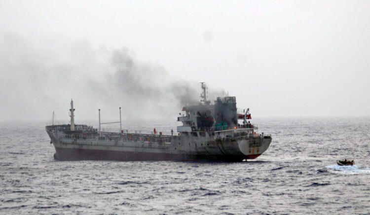 Gulf of Oman: Thick smoke billows from MT Yi Cheng 6 as Indian Navy personnel approach the burning vessel during a firefighting operation on Saturday, June 29, 2025. (Photo: IANS/X/@indiannavy)