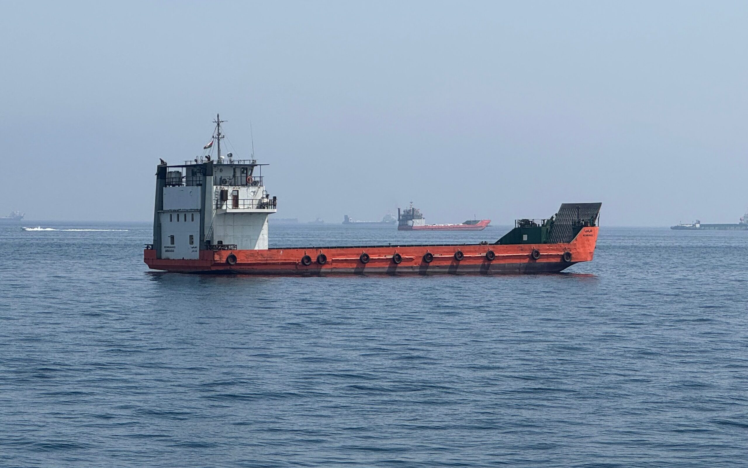 Khasab: This photo taken with a mobile phone shows merchant vessels stranded in the waters of the Strait of Hormuz, near Khasab, a small town in northern Oman, May 29, 2026. (Photo: Xinhua via IANS)