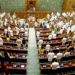 New Delhi: Lok Sabha Speaker Om Birla and other MPs stand for the national song in the House during the Monsoon Session of Parliament in New Delhi on Thursday, August 13, 2026. Lok Sabha on Thursday adjourned sine die. (Photo: IANS/Sansad TV)