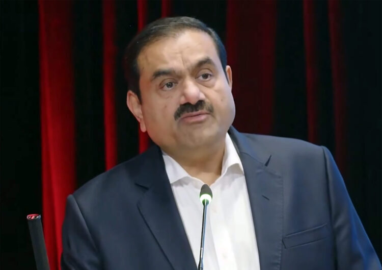 New Delhi: Adani Group Chairman Gautam Adani addresses an event celebrating Adani Ports and Special Economic Zone (APSEZ) crossing the 500 million tonnes cargo milestone on Friday, April 3, 2026. (Photo: IANS)