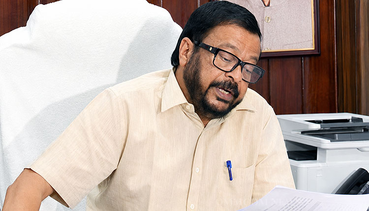 Revenue and Disaster Management Minister Suresh Pujari