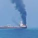 Oman Coast: Smoke billows from the merchant vessel MT Jalveer after it caught fire following an incident near the Omani port of Shinas on Thursday, June 11, 2026. Around 20 Indian crew members were reported to be on board and evacuation operations were underway. (Photo: Screen grab/FSUI)